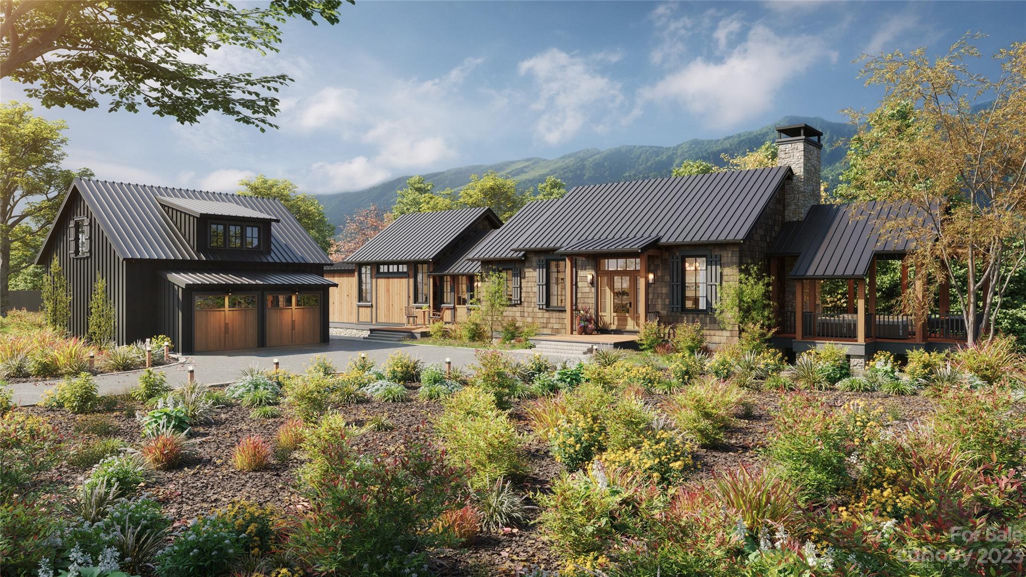 Contemporary mountain homes with dark metal roofs, a two-car garage, and landscaped grounds.